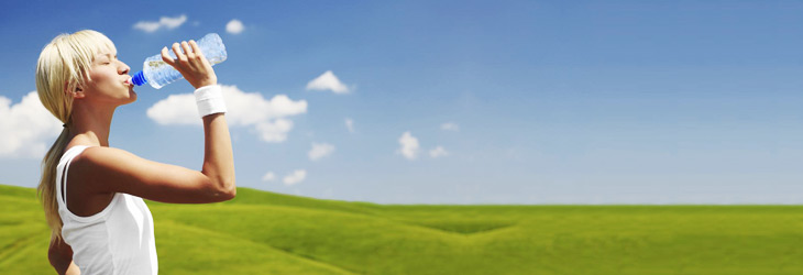 Water pouring into glasses